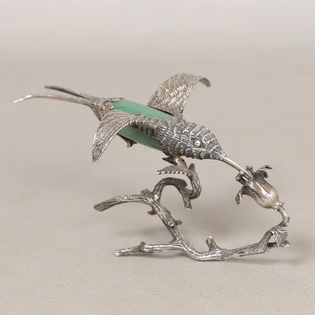 A CHINESE SILVER HUMMING BIRD.