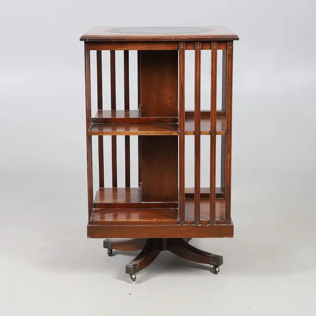 A BEVAN FUNNELL 'REPRODUX' REVOLVING BOOKCASE.