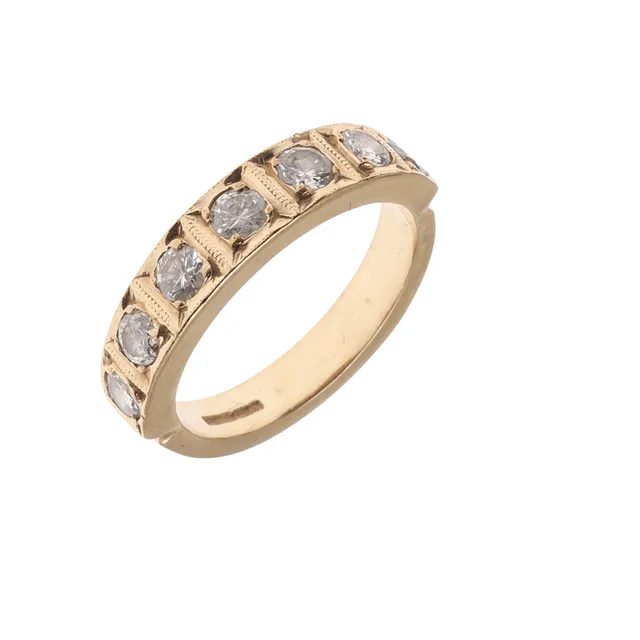 A DIAMOND AND 9CT GOLD HALF HOOP RING.