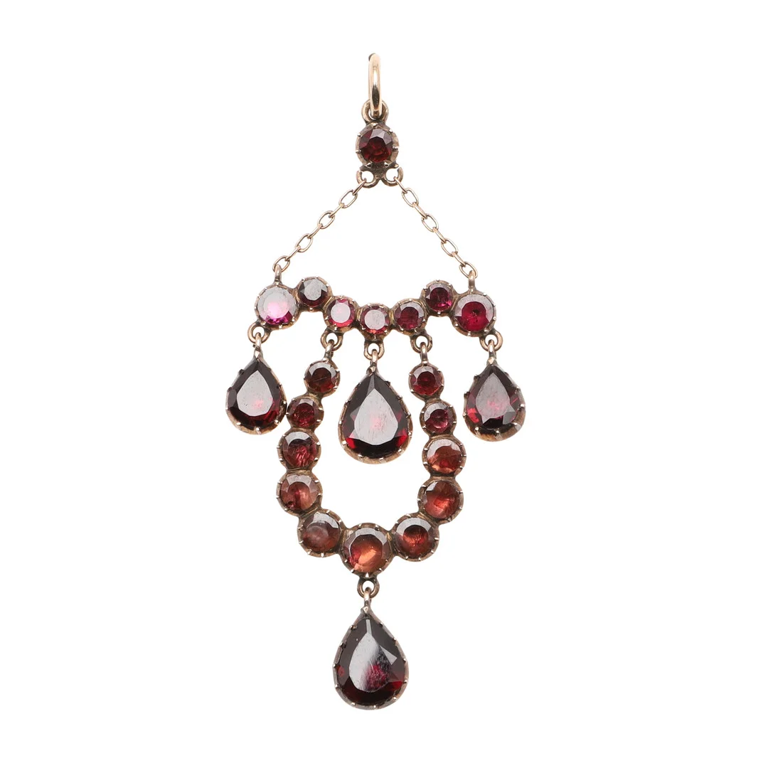 A GEORGIAN GARNET AND GOLD PENDANT. — Brooches & Pendants — Lawrences Auctioneers