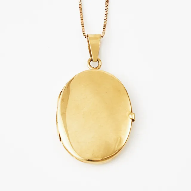 MEDALJONG med KEDJA, 18K guld, 1900-tal.
