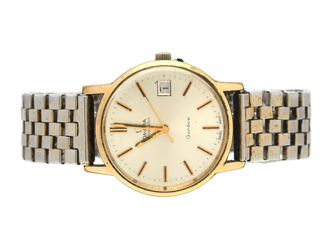 OMEGA, Genève, Cal 1012, Serie nr. 37658817, Ref nr. MD 166.0163, Boett nr. 166.0163 (HF), herrur, 34,5 mm, doublé (skadad, 20 micron), automatisk, plexiglas, datum, skadad urtavla, defekt (behov av service), ca 1973. — Klockor/Omega — Kaplans