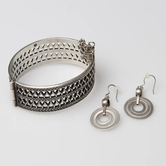 KALEVALA KORU, "Uskela" armband samt örhängen, ett par, sterlingsilver.