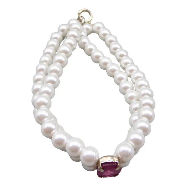 PERLENARMBAND MIT EINEM NATÜRLICHEM RUBIN VON 2,4CT UND 925ER SILBER.