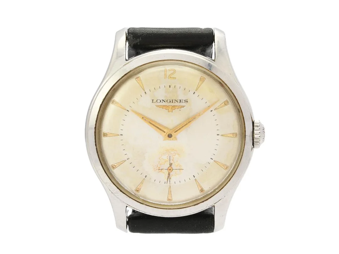 LONGINES, herrur, 35 mm, Cal 12.68Z, Serie nr. 10728991, Boett nr. 6263 18 / 455, stål, manuell, plexiglas, liten sekundvisare, skadad urtavla/visare, defekt (går ej, akut servicebehov), läderband, ca 1958. — Klockor/Longines — Kaplans
