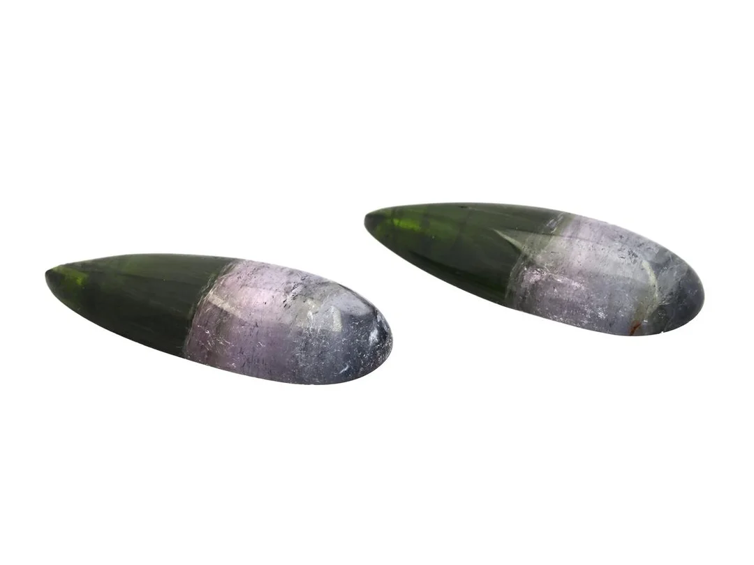 2 TURMALINER, droppslipade, 58,81 ct, mått 37 x 14,3 mm, nagg. — Ädelstenar/Turmaliner — Kaplans