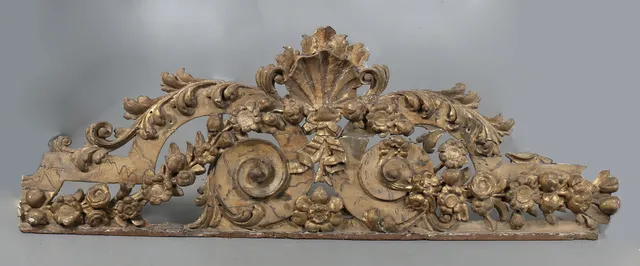 Baroque finish in carved, polychrome and gilded wood, 18th Century.