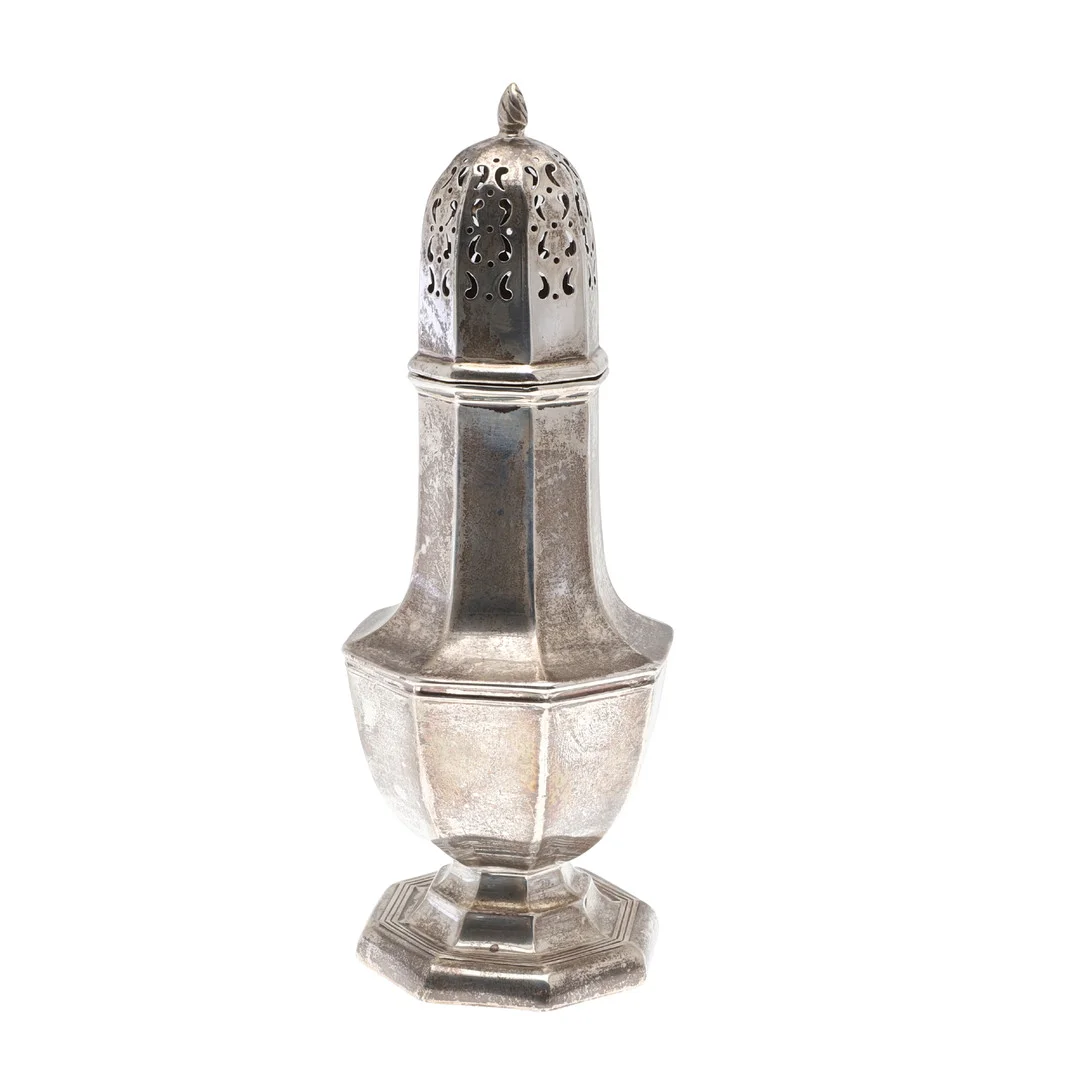 A LARGE EDWARDIAN SILVER OCTAGONAL BALUSTER FORM SUGAR CASTER. — Silver — Lawrences Auctioneers