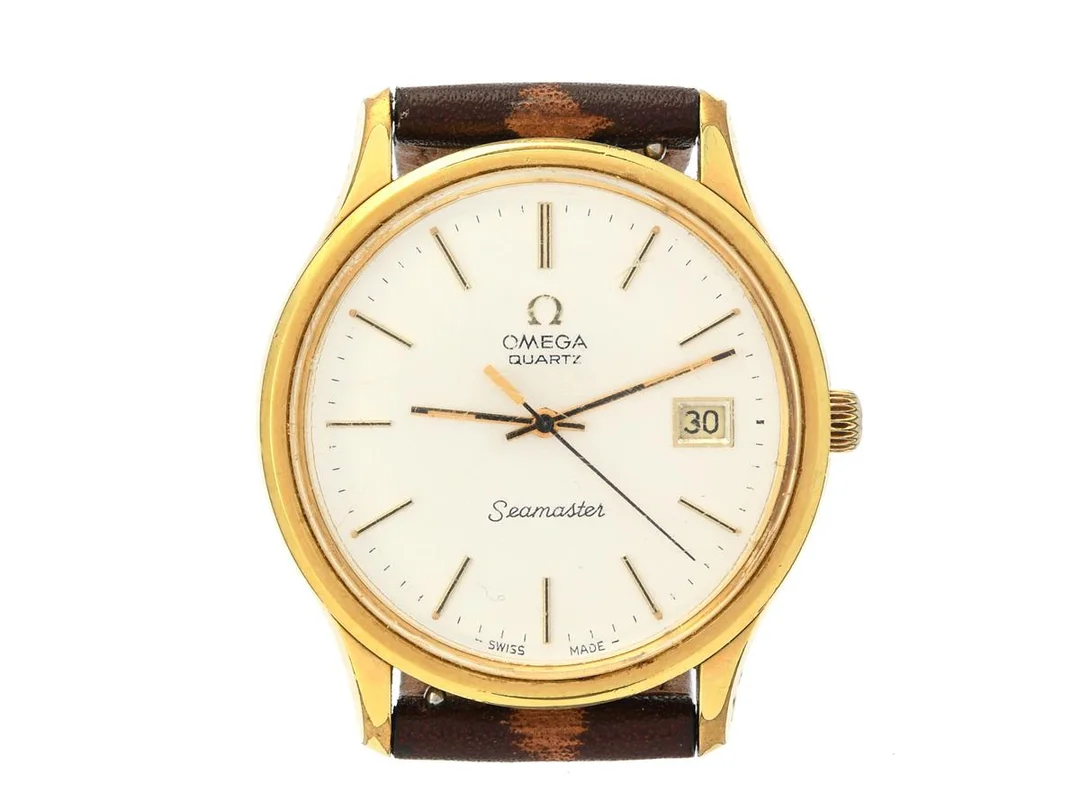OMEGA, Seamaster, Cal 1342, Serie nr. 40325622, Ref nr. MD 196.0106, Boett nr. 196.0106 (LL), herrur, 36 mm, doublé (skadad, 20 micron), quartz, plexiglas, datum, defekt, läderband, ca 1977. — Klockor/Omega — Kaplans