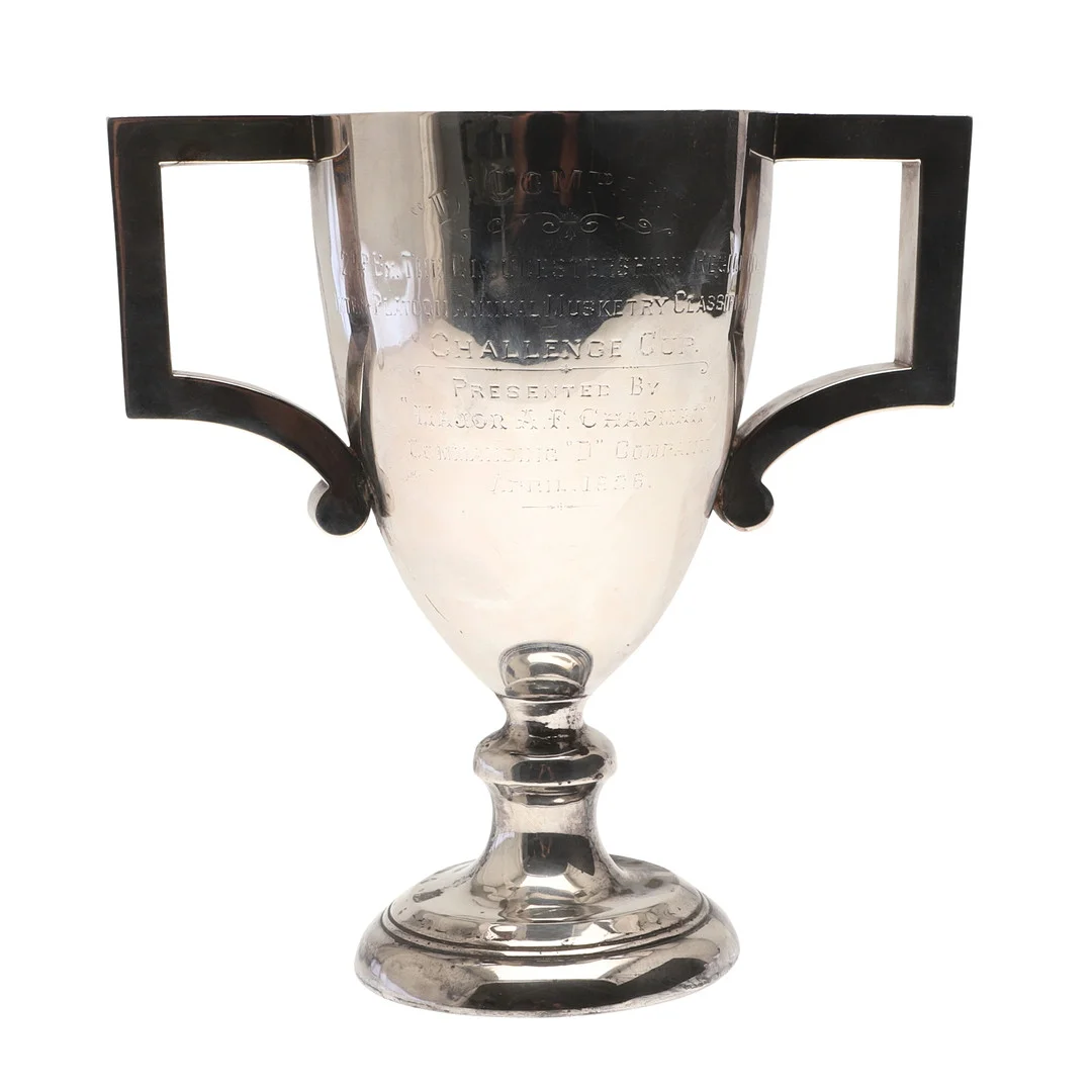 AN EARLY 20TH CENTURY SILVER TWIN HANDLED TROPHY CUP, MILITARY INTEREST. — Silver — Lawrences Auctioneers