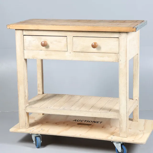 A 20TH CENTURY PAINTED PINE BUTCHERS BLOCK.