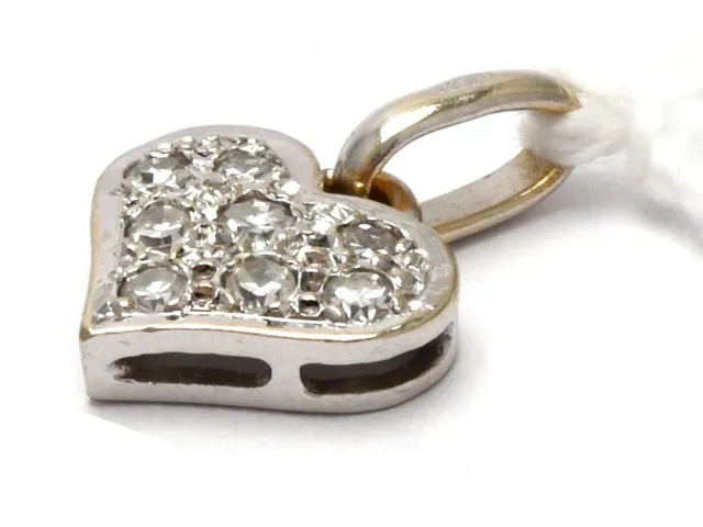 Hänge 18K vitguld 1,1g, diamanter 8xca0,01-0,02ct