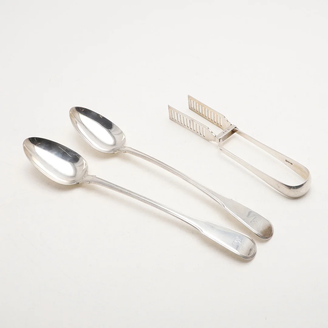 A PAIR OF GEORGE III SERVING SPOONS. — Silver — Lawrences Auctioneers