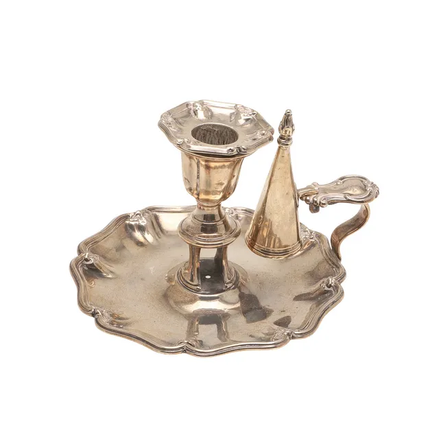 A VICTORIAN SILVER CHAMBERSTICK.