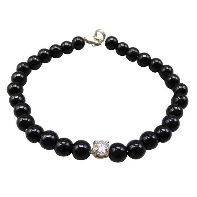 ARMBAND MIT SCHWARZEM ONYX UND EINEM MOISSANITE VON 0,5 CT.