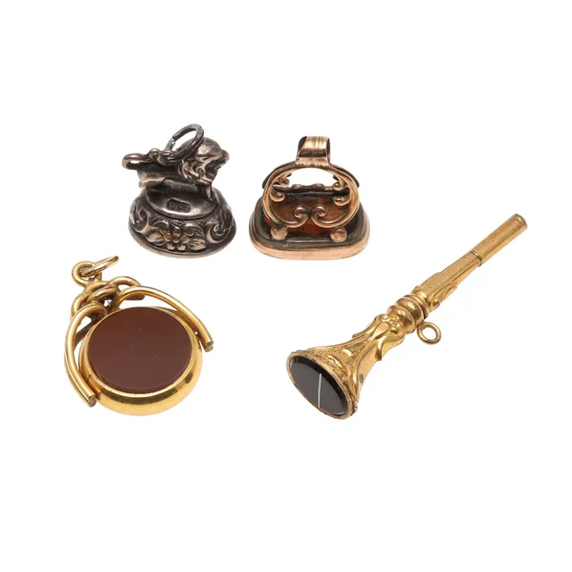 A GOLD SPINNING FOB.