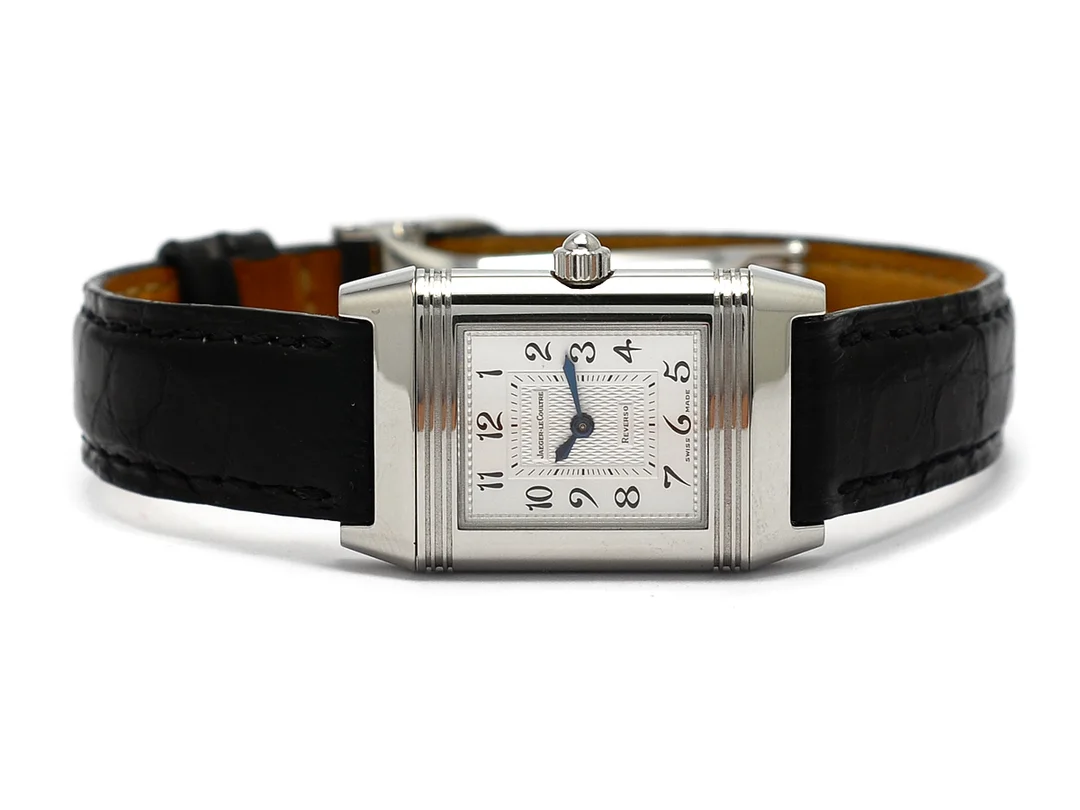 JAEGER-LE COULTRE, Reverso, Duetto, Cal 844, Serie nr. 2219911, Ref nr. 266.84.20, Boett nr. 266.8.44, damur, 20,5 x 28,5 (33) mm, stål, manuell, safirglas, pärlemorurtavla, briljanter på boetten (32 st. TW/VVS, ca 0,22 ctv), läderband, viklås, cert, mars 2006, box, ytterkartong. — Klockor/Jaeger-Le Coultre — Kaplans