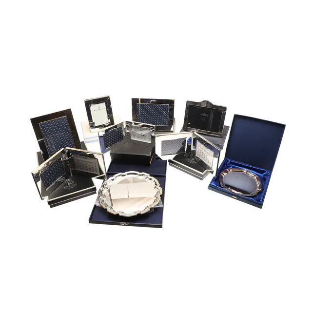 A QUANTITY OF BOXED SILVER PLATED PHOTOGRAPH FRAMES AND A SALVER.