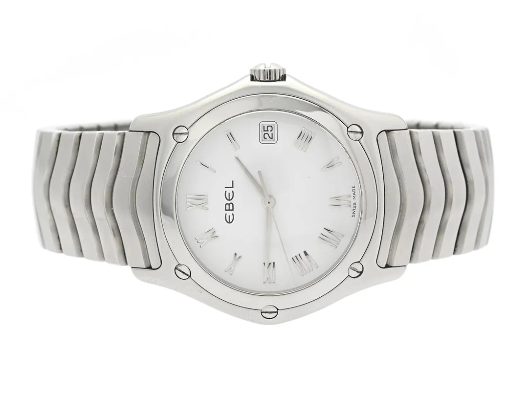 EBEL, Classic Wave, Senior, Serie nr. 58516189, Boett nr. E9187F41, herrur, 37 mm, stål, quartz, safirglas, datum, skadad urtavla, integrerad länk, viklås, Ref nr. 0403/25F4, ca 2003, box, ytterkartong. — Klockor/Ebel — Kaplans