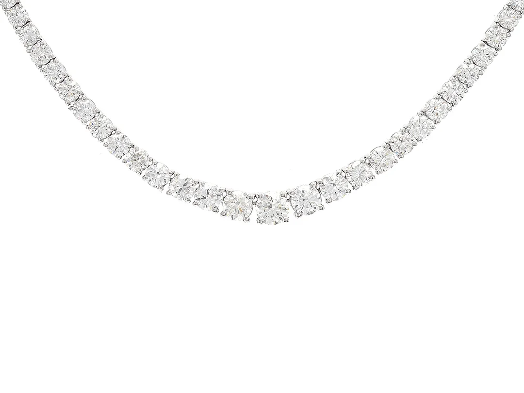 RIVIERECOLLIER, 18K vitguld, 165 st briljantslipade diamanter ca 9,16 ctv, ca G-I/VVS-VS, doserat, längd 42 cm, vikt 18,5 g. — Smycken/Collier — Kaplans