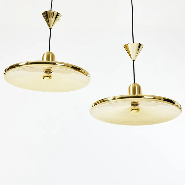 TOM DIXON. "Spun", takarmaturer, 1 par, mässing, etikettmärkning.