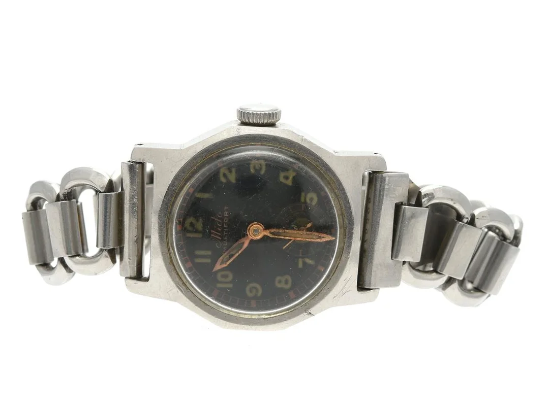 Mido multisport herrur, 28mm, manuell 475306, plexiglas, stållänk, slitage i urtavlan, ca 1945 — Klockor/Mido — Kaplans