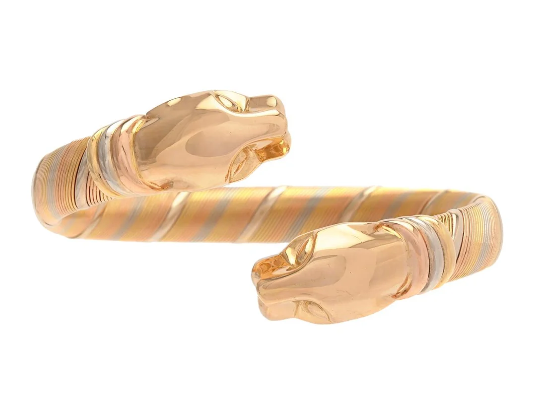 CARTIER, armring, Panthére, 18K trefärgat guld, serienr. 153873, stl 6,0x4,5 cm, vikt 49,9 g, originaletui. — Smycken/Armring — Kaplans