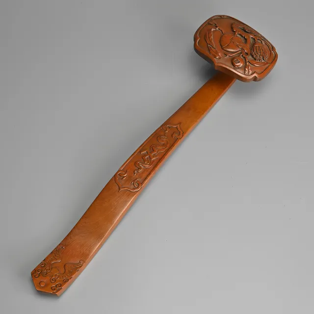 A CHINESE CARVED HUANGYANG RUYI SCEPTRE, QIANLONG MARK.