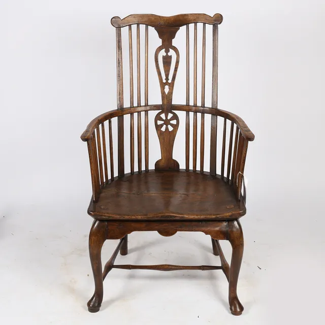 A GEORGE III AND LATER ELM WINDSOR ARMCHAIR.
