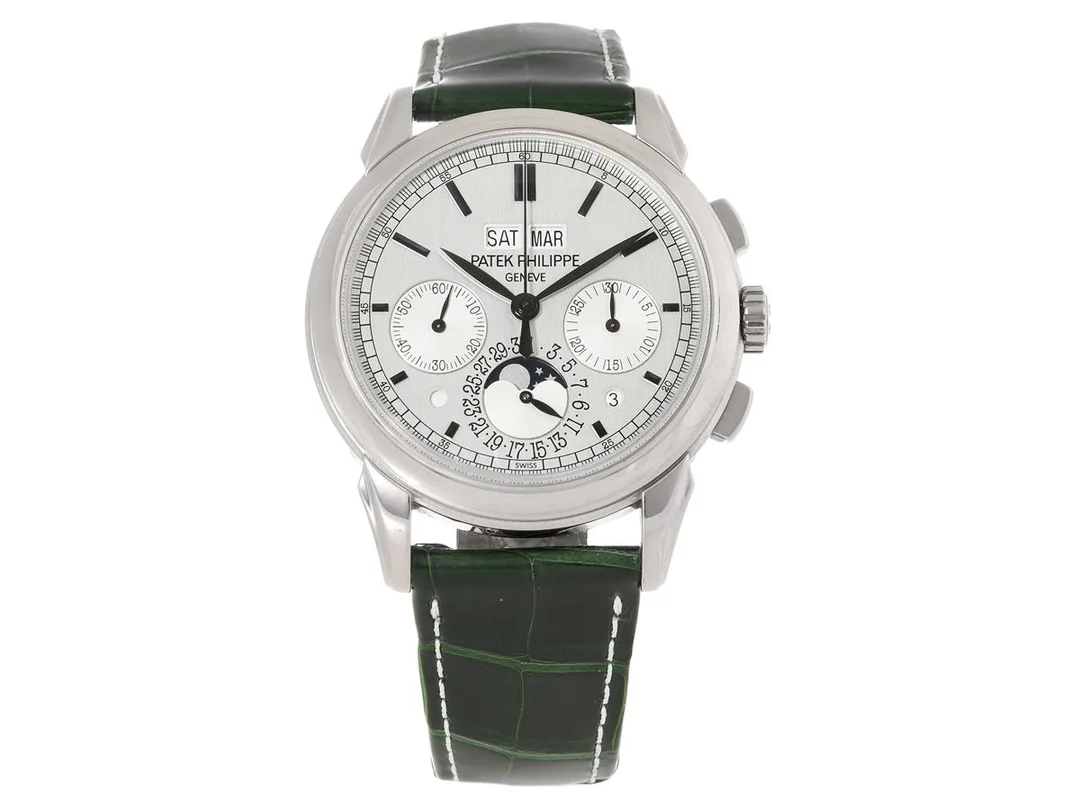 PATEK PHILIPPE, Perpetual Calendar, Cal CH 29-535 PS Q, Serie nr. 5643379, Ref nr. 5270G-001, Boett nr. 4565020, kronograf, herrur, 41 mm, 18K vitguld, manuell, safirglas, evighetskalender (dag, datum, månad, månfas, skottår, natt/dag), glasbaksida/extra bakboett i 18K vitguld (Nr. 4556007), läderband, viklås i 18K vitguld, "Extract from the Archives", såld 28/6 2012, box, ytterkartong. — Klockor/Patek Philippe — Kaplans