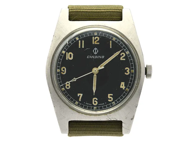 CANDINO, " T Swiss Made T", herrur, 35 mm, Cal ETA 2750, Ref nr. 10511, Boett nr. 1586, stål, manuell, plexiglas, gravyr (Tre Kronor), NATO-band, ca 1968.