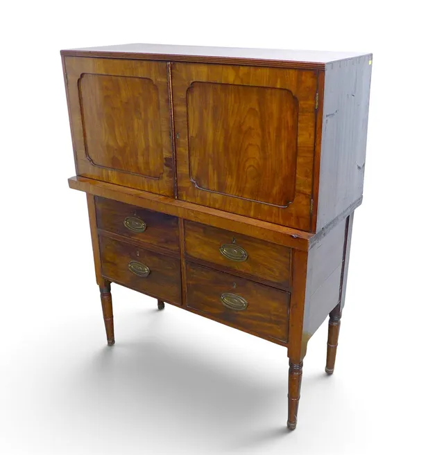 AN ASSOCIATED 19TH CENTURY MAHOGANY CABINET.
