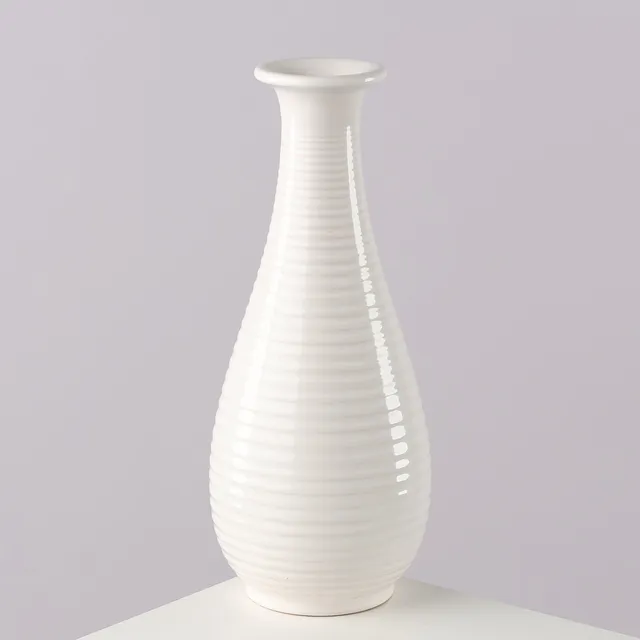 LAURITZ HJORTH. Dråbeformet vase af hvidglaseret keramik, dekoreret med horisontale riller, model 312, Danmark, 1900-tallets midte.