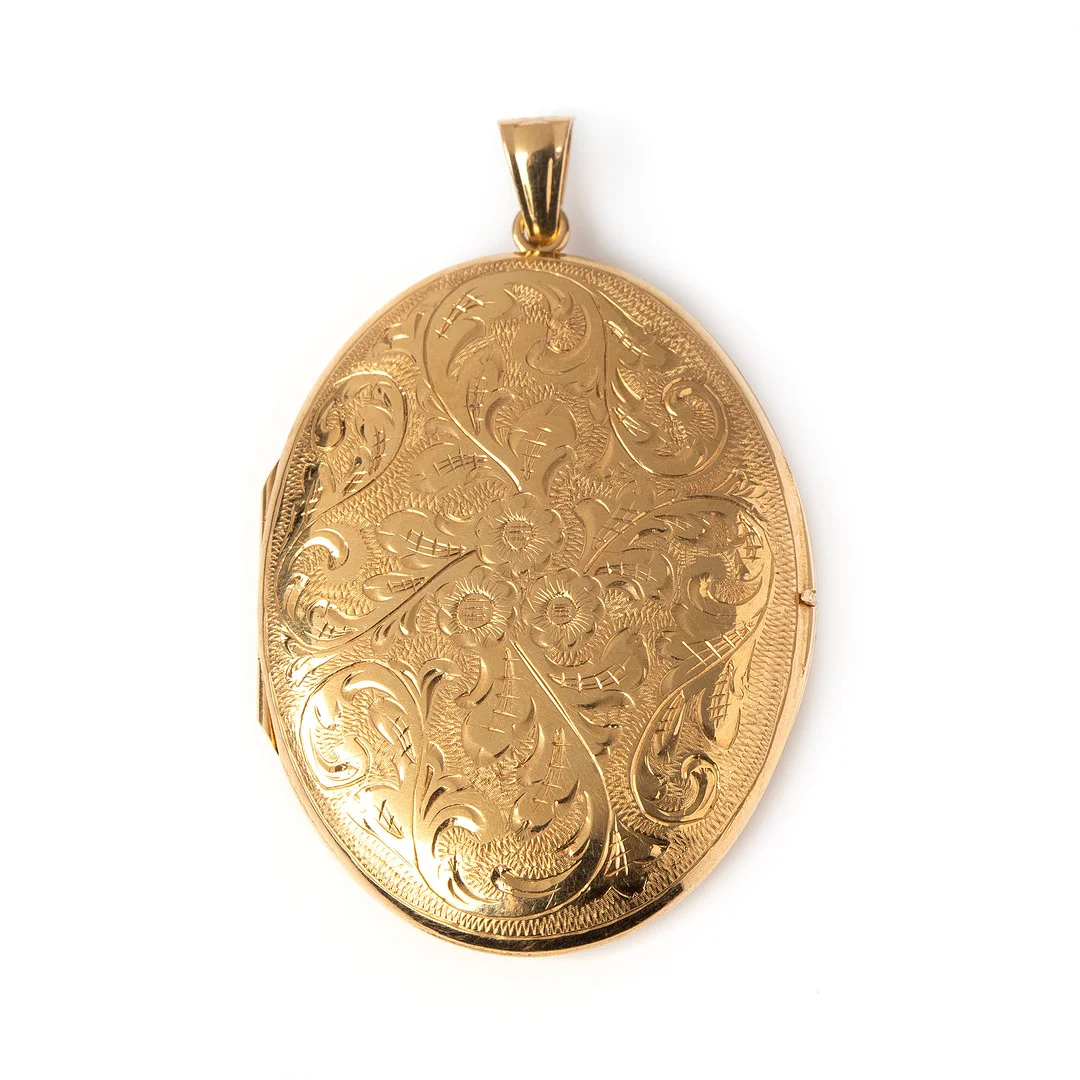 MEDALJONG. 18K guld, CESON. — Brooches & Pendants — Stockholms Auktionsverk Göteborg