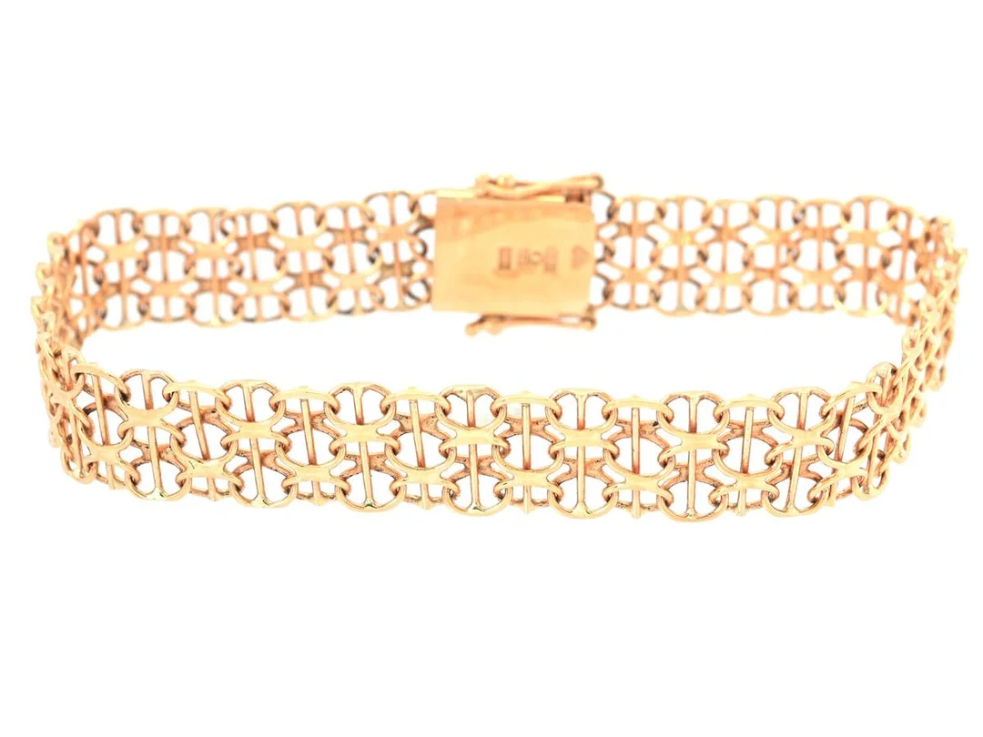 ARMBAND, 18K guld, X-länk med stav, bredd 9 mm, längd 18,5 cm, vikt 11,3 g. — Smycken/Armband — Kaplans