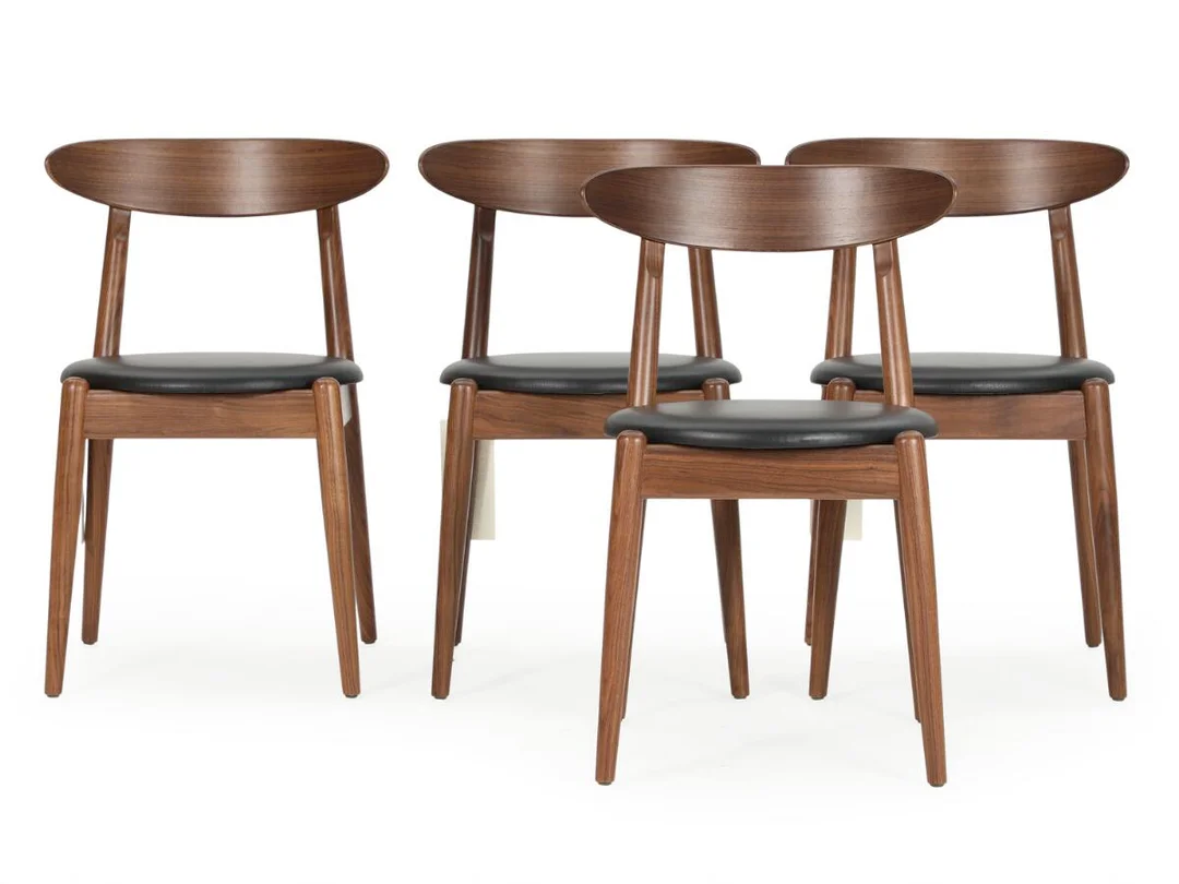 “Louisiana Chair”. Four walnut chairs, upholstered in seats with black leather. Designed 1958. Manufactured and marked by Stellar Works. (4) — Modern Furniture — Bruun Rasmussen