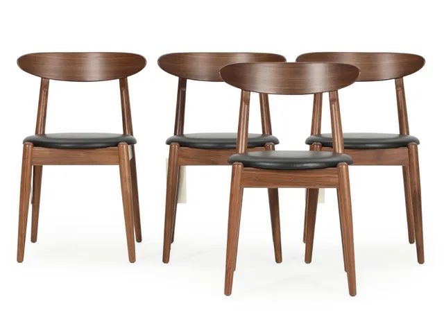 “Louisiana Chair”. Four walnut chairs, upholstered in seats with black leather. Designed 1958. Manufactured and marked by Stellar Works. (4)