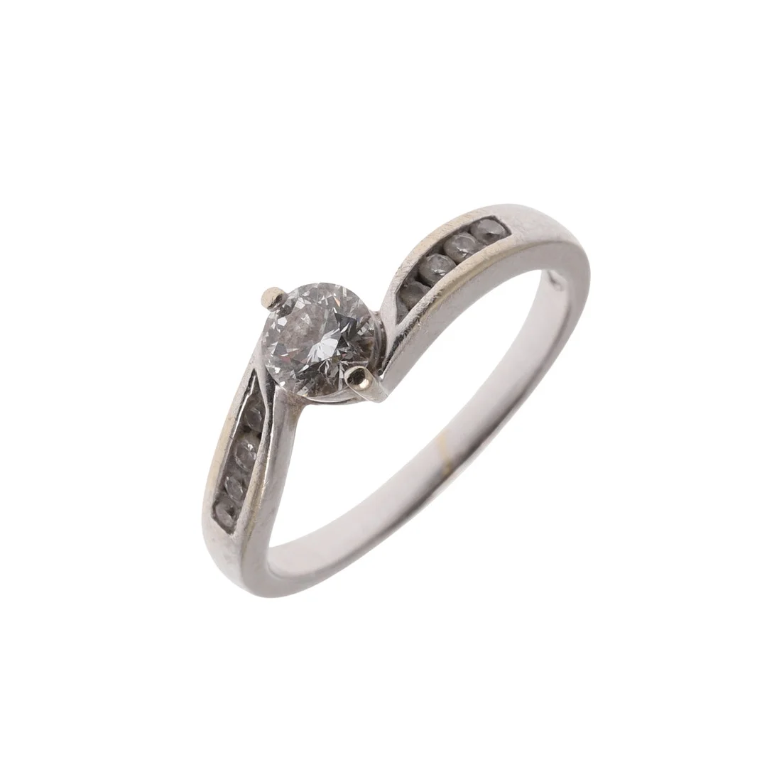 AN 18 CT GOLD AND DIAMOND SOLITAIRE RING. — Rings — Lawrences Auctioneers