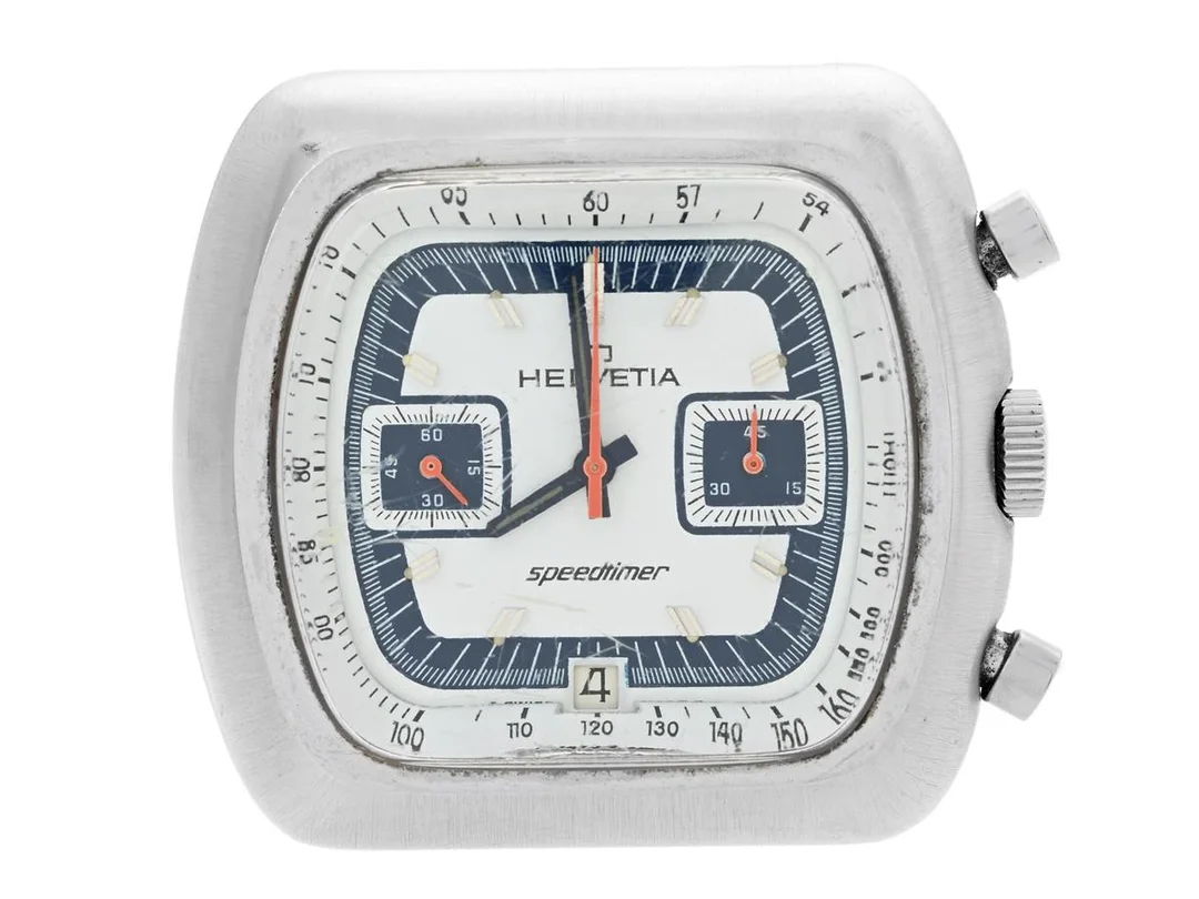 HELVETIA, Speedtimer, Cal Valjaux 7734, Boett nr. 7734.001.10 / 49, kronograf, herrur, 42 x 39 mm, stål, manuell, plexiglas (skadat), datum, skadad urtavla, ca 1970. — Klockor/Helvetia — Kaplans