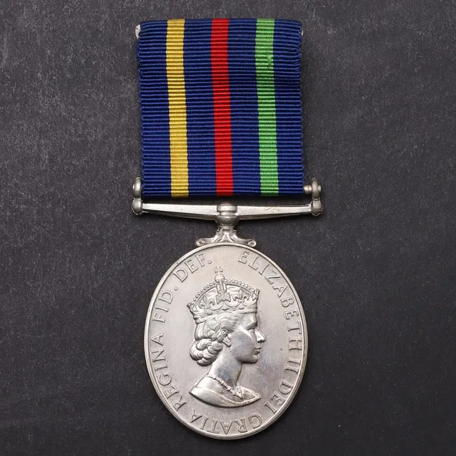 A CIVIL DEFENCE SERVICE LONG SERVICE MEDAL.