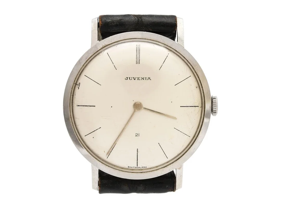 JUVENIA, Slimatic, Cal MFG 664, Boett nr. 463105, herrur, 33,2 mm, stål, automatisk, plexiglas, skadad urtavla, läderband, ca 1960. — Klockor/Juvenia — Kaplans