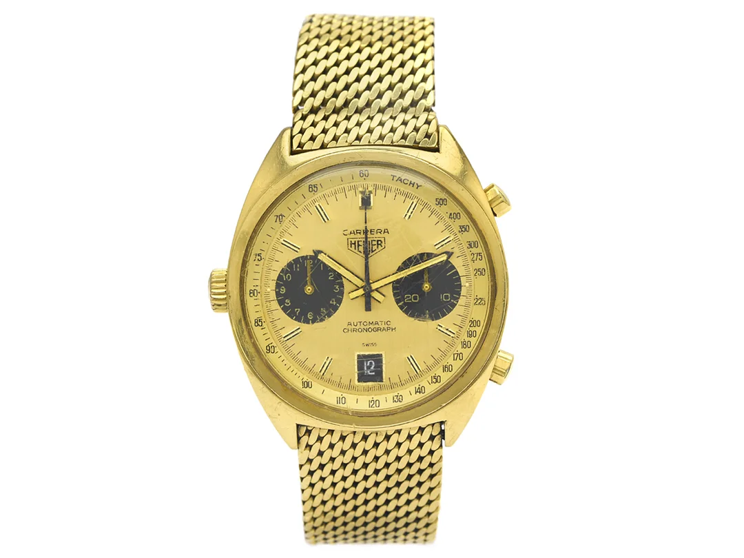HEUER, Carrera, "Tachy", "Mr. Ronnie Peterson, gift to his father Bengt", Cal 12, Serie nr. 241012, Ref nr. 1158, kronograf, herrur, 38,5 mm, 18K guld, automatisk (microrotor), plexiglas, datum, gravyr, Boett signerad: Heuer-Leonidas SA, originallänk, viklås, Ref nr. 3.71 (G&F), längd 191-210 mm, totalvikt 149,9 gram, ca 1972, box (ej komplett). — Klockor/Tag Heuer — Kaplans