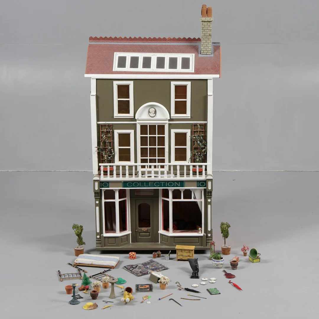 A 20TH CENTURY DOLLS HOUSE/SHOP. — Toys — Bishop & Miller