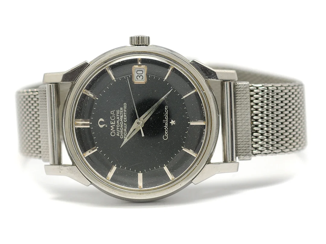 OMEGA, Constellation, Chronometer, Cal 561, Serie nr. 23919594, Ref nr. ST 168.005, Boett nr. 168.005, herrur, 34,2 mm, stål, automatisk, plexiglas, datum, skadad urtavla, OBS: utbytt boett, ca 1966. — Klockor/Omega — Kaplans