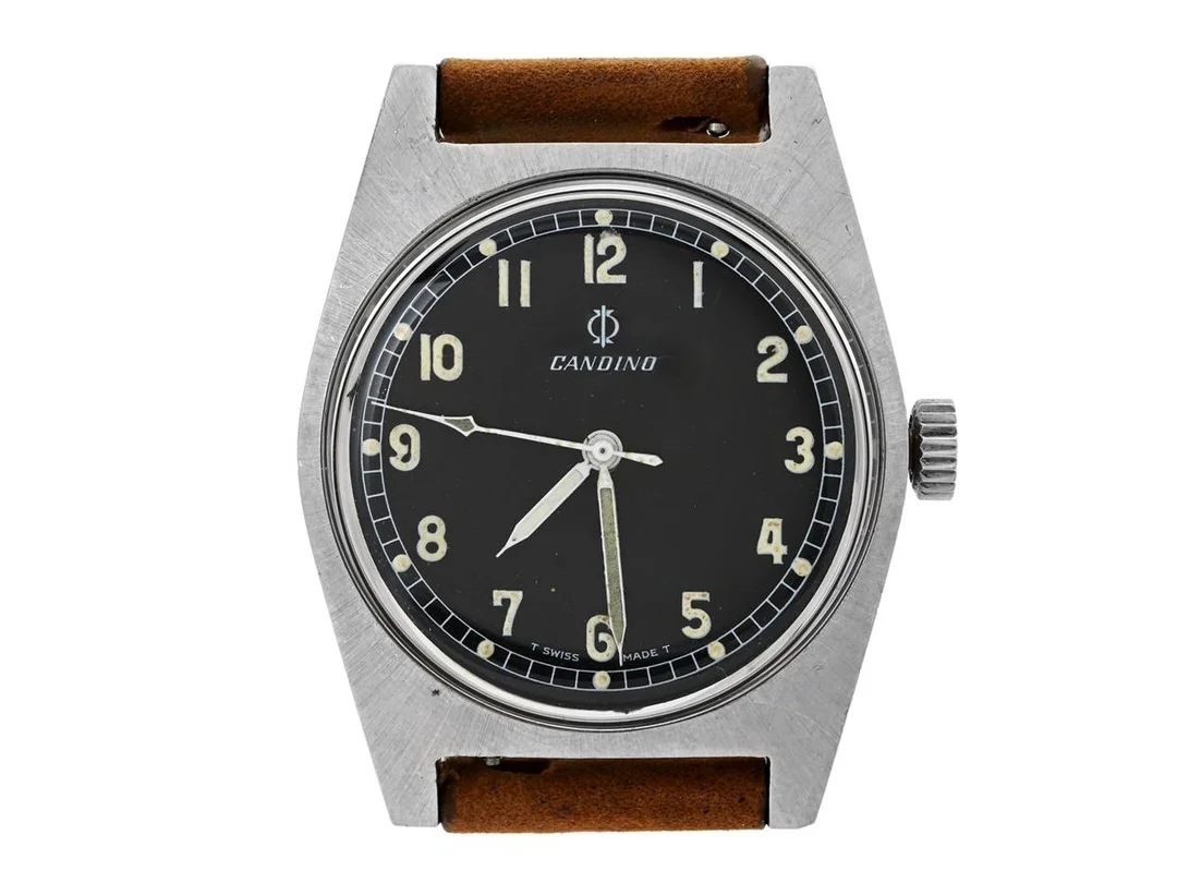 CANDINO, herrur, 35 mm, (T Swiss Made T), Cal ETA 2750, Ref nr. 10511, Boett nr. 0508, stål, manuell, plexiglas, gravyr (Tre Kronor), läderband, ca 1968. — Klockor/Candino — Kaplans