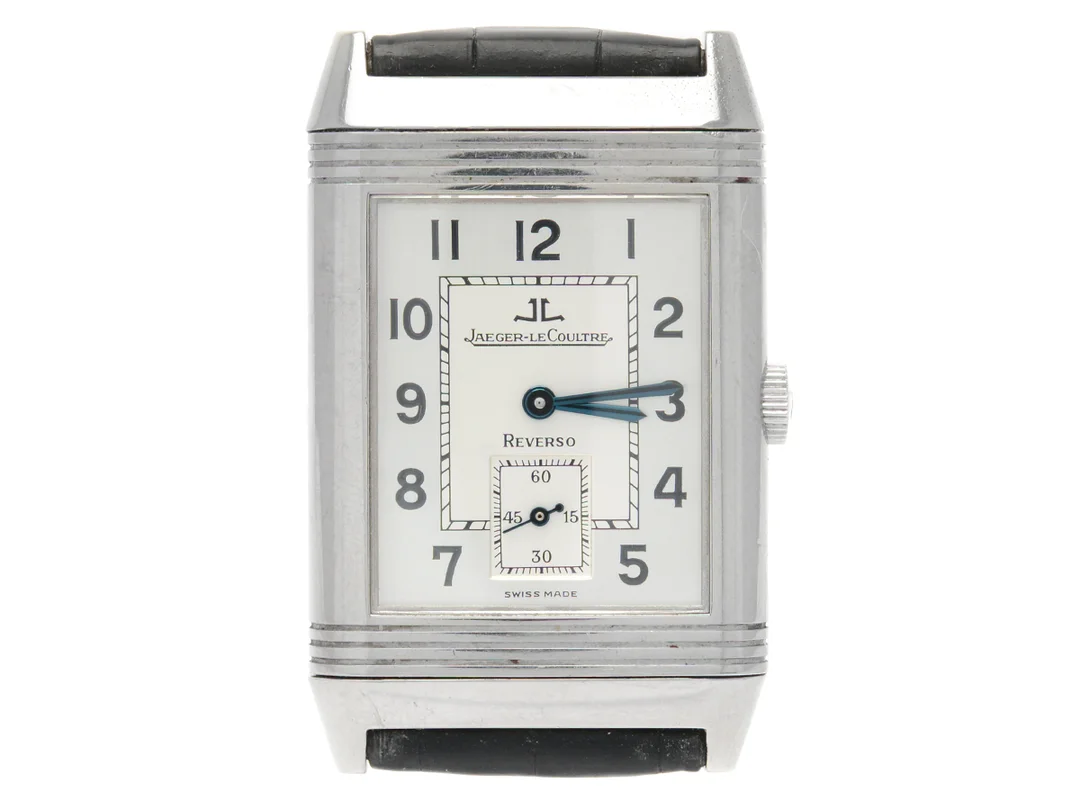 JAEGER-LE COULTRE, Reverso, Grande Taille, Cal 822 Serie nr. 1724634, Ref nr. Q2708410, Boett nr. 270.8.62, herrur, 26 x 36,5 (42,3) mm, stål, manuell, safirglas, liten sekundvisare, skadad urtavla, läderband, originalspänne, cert, maj 1994, etui (skadat), ytterkartong. — Klockor/Jaeger-Le Coultre — Kaplans