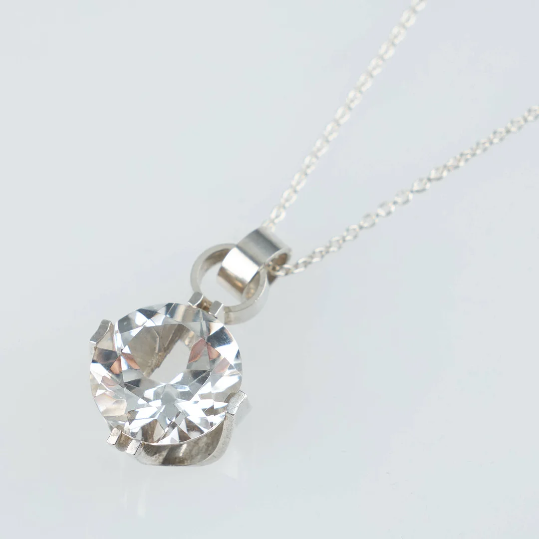 ELIS KAUPPI. Hänge, 925 silver, bergkristall, Kupittaan Kulta. — Necklace — Stockholms Auktionsverk Helsinki