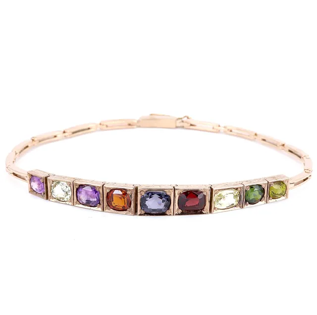 9CT GOLD GEMSTONE BRACELET.
