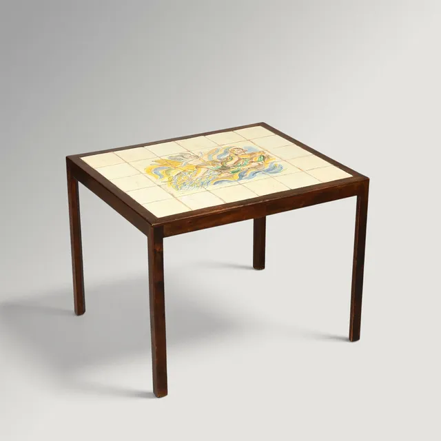 JAIS NIELSEN (1885-1961). Coffee table in dark-stained wood with 30 glazed tiles, decorated with hand-painted religious motif, Danish cabinetmaker, dated 1942.