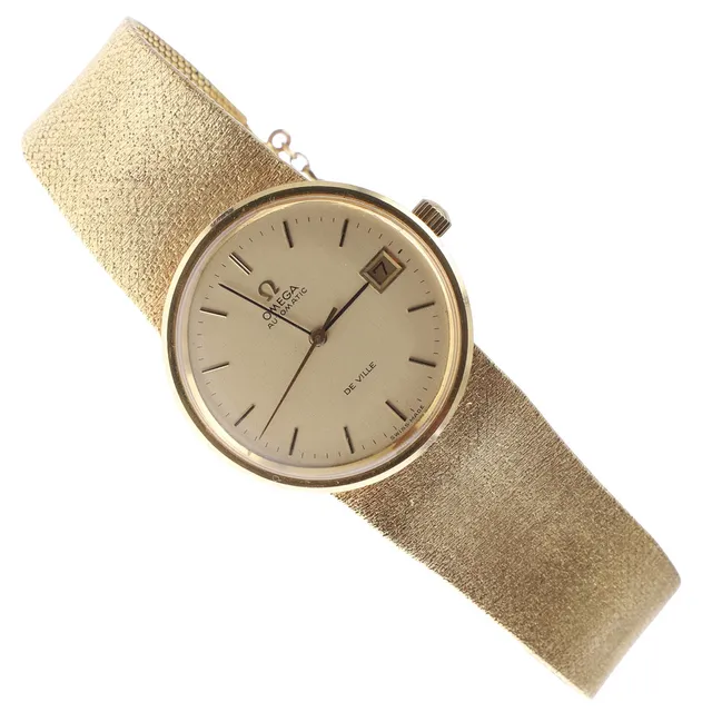 A GENTLEMAN'S 18CT GOLD AUTOMATIC DE VILLE WRISTWATCH BY OMEGA.